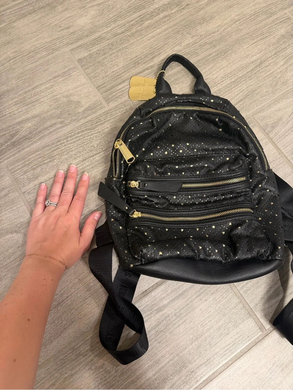 Steve Madden Black Mini Backpack with Gold Star Accents